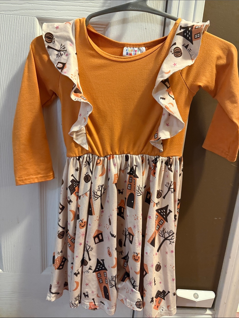 Dot Dot Smile Orange and Cream Halloween Print Ruffle Dress